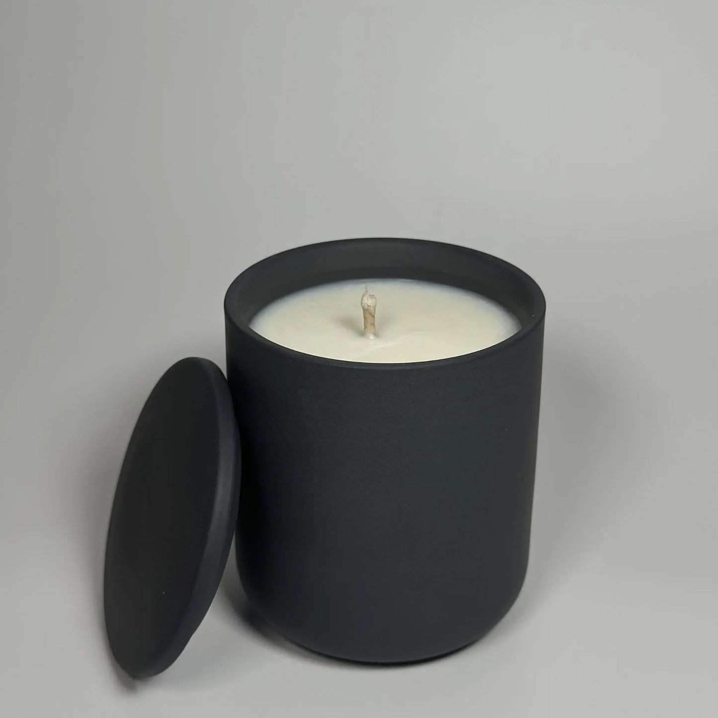 Warm woods and cashmere sandalwood ceramic jar candle, front view, luxury soy wax scented candle