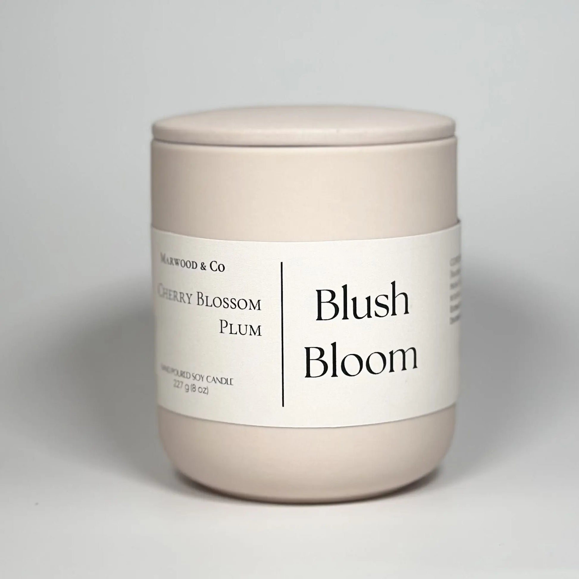 Cherry blossom ceramic jar candle, frontal view, hand-poured soy wax, best scented candles for home, luxury fragrance, long-burning decorative candle